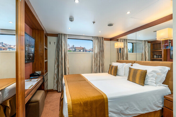 Amawaterways AmaVida Category D & E Stateroom Bedroom 2 ©Bruno Barreira & Amawaterways.jpeg